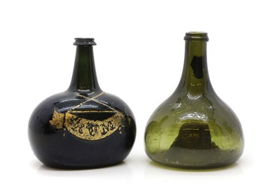 Lot 233 - An olive green glass decanter