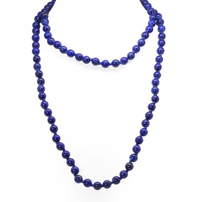 Lot 199 - A lapis lazuli bead necklace