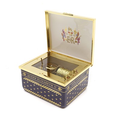 Lot 136 - A Halcyon Days porcelain music box