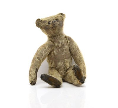 Lot 230 - A mohair and straw filled teddy bear