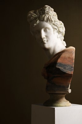 Lot 369 - A carved marble bust after the antique
