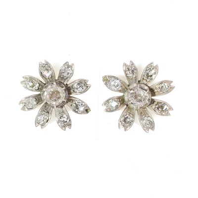 Lot 178 - A pair of diamond flower stud earrings