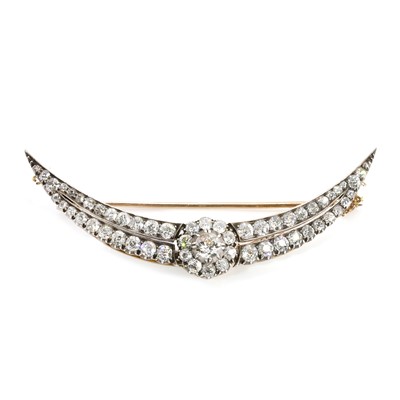 Lot 24 - A Victorian diamond crescent brooch