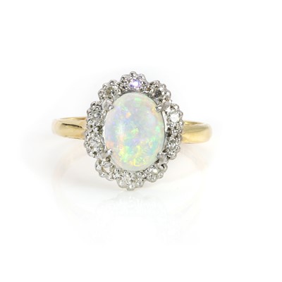 Lot 123 - An 18ct gold opal and diamond cluster ring