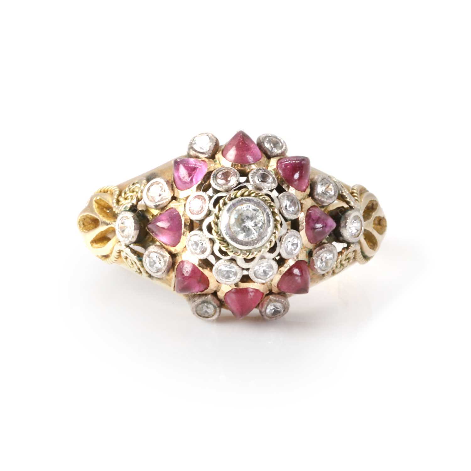 Lot 1175 - A ruby and colourless sapphire Thai princess ring