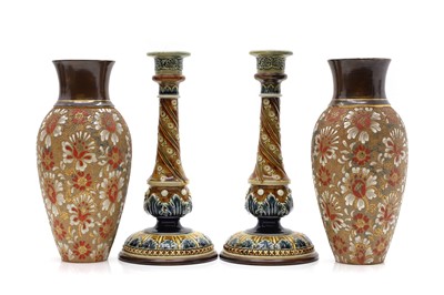 Lot 81 - A pair of Doulton Lambeth stoneware candlesticks