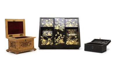 Lot 46 - A Chinese gilt-lacquered games box