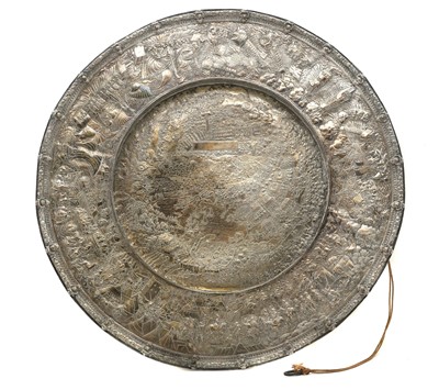 Lot 517 - A large white metal commemorative charger