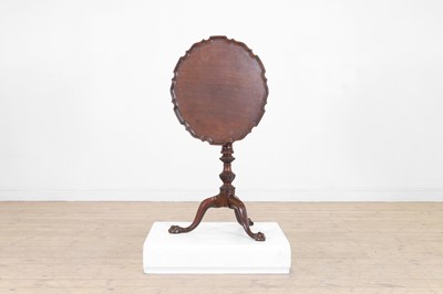 Lot 422 - A George III-style mahogany piecrust tripod table