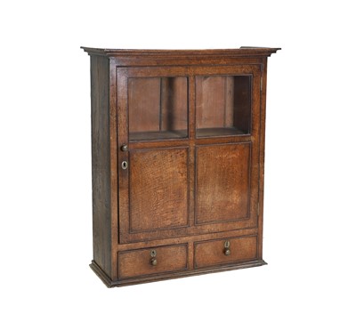 Lot 367 - A Georgian oak wall cupboard