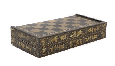 Lot 308 - A Chinese gilt-lacquered folding games box