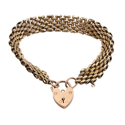 Lot 1248 - A gold padlock bracelet