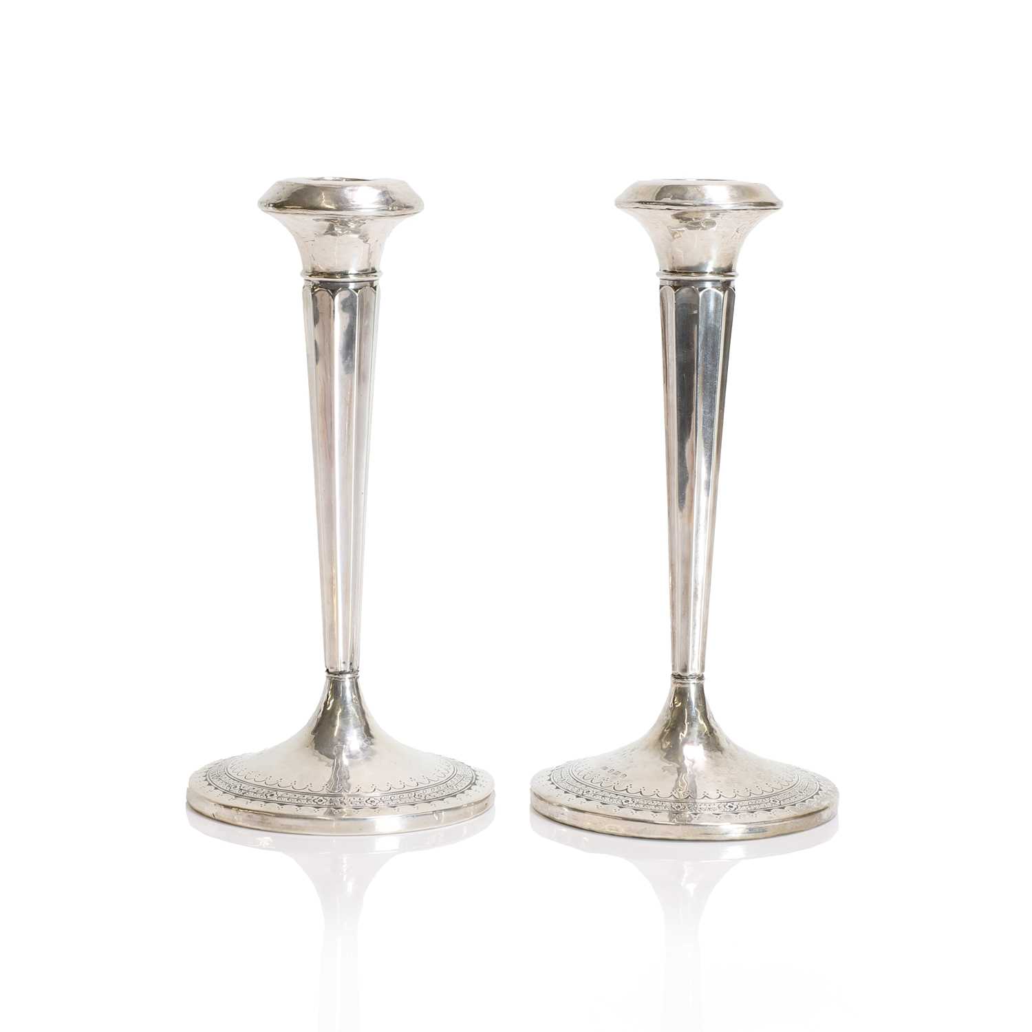 Lot 34 - A pair of Liberty & Co. silver candlesticks