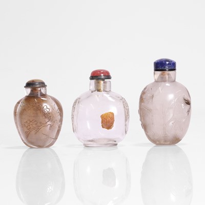 Lot 176 - A collection of three Chinese rock crystal snuff bottles