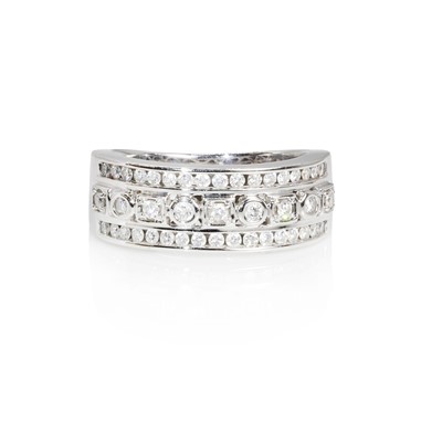 Lot 160 - An `18ct white gold three row diamond ring, by Iliana