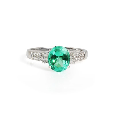 Lot 239 - An 18ct white gold emerald and diamond ring, by Iliana