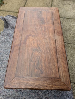 Lot 758 - A Chinese padouk opium table