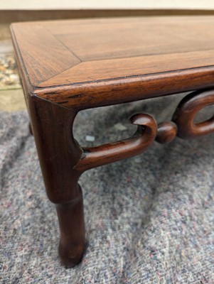 Lot 758 - A Chinese padouk opium table