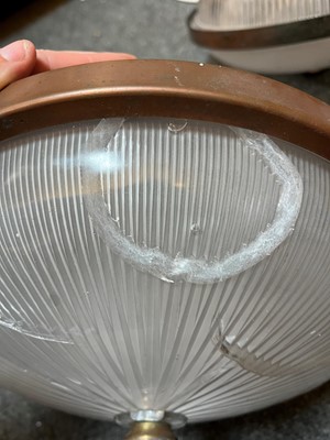 Lot 359 - A pair of Holophane glass pendant lights