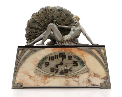 Lot 405 - An Art Deco marble and spelter clock