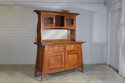 Lot 33 - A Liberty Arts and Crafts oak sideboard