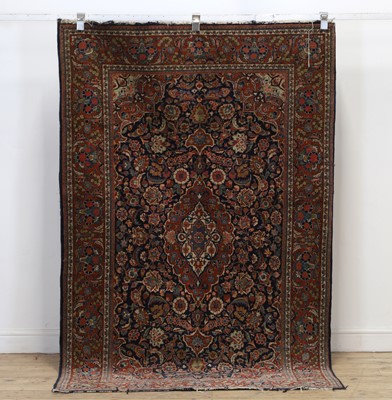 Lot 297 - A Kashan wool rug