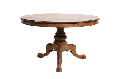 Lot 409 - A Victorian walnut and floral marquetry centre table