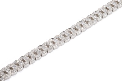 Lot 171 - An 18ct white gold C de Cartier diamond line bracelet