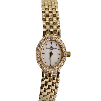 Lot 374 - A ladies' 14ct gold Baume & Mercier quartz bracelet watch