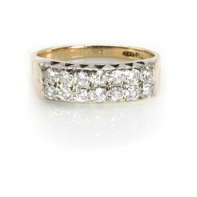 Lot 142 - A 9ct gold two row diamond ring