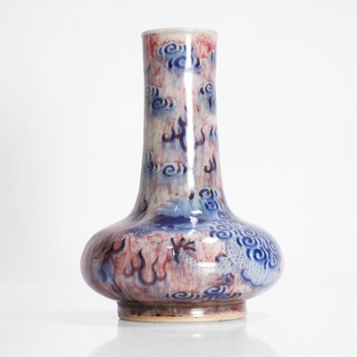 Lot 126 - A Chinese copper-red and underglaze blue vase