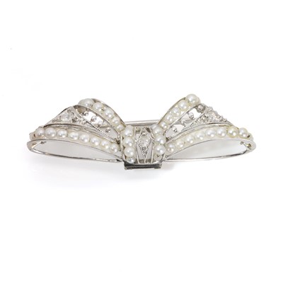 Lot 45 - A seed pearl and diamond bow brooch