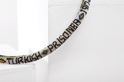 Lot 435 - A First World War prisoner-of-war beadwork snake