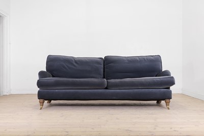 Lot 607 - A two-seater sofa in the Howard & Sons style