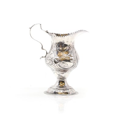 Lot 16 - A George III silver cream jug