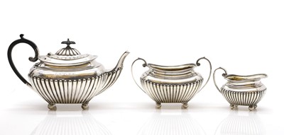 Lot 17 - A silver three piece bachelor’s tea service