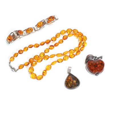 Lot 1362 - A group of amber jewellery