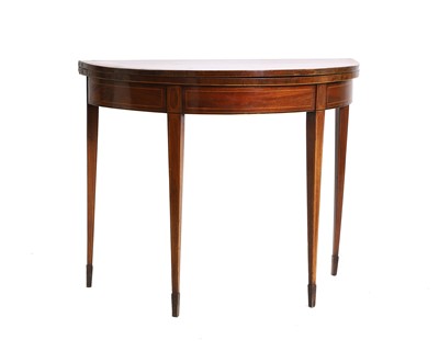 Lot 424 - A George III mahogany fold over card table