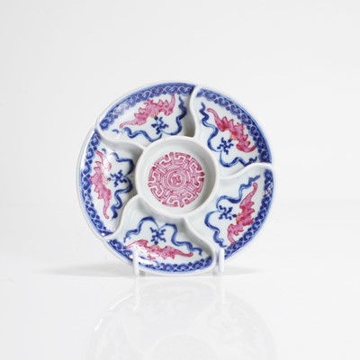 Lot 99 - A Chinese underglaze blue and puce-enamelled sweetmeat dish