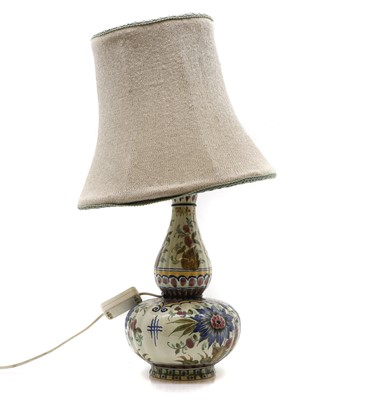 Lot 118 - A Delft pottery lamp