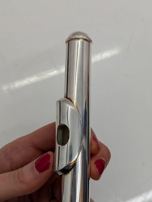 Lot 223 - Two Trevor J. James silver plated flutes
