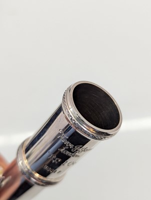 Lot 223 - Two Trevor J. James silver plated flutes