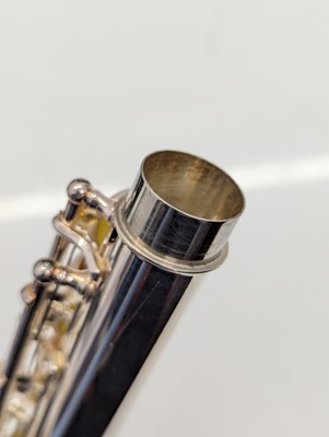Lot 223 - Two Trevor J. James silver plated flutes