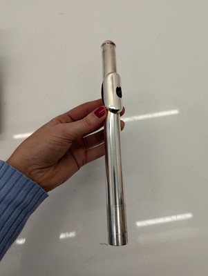 Lot 223 - Two Trevor J. James silver plated flutes