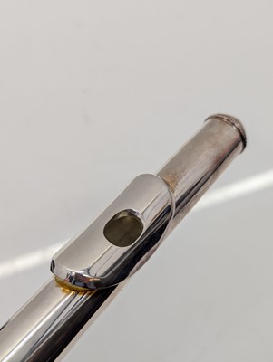 Lot 223 - Two Trevor J. James silver plated flutes