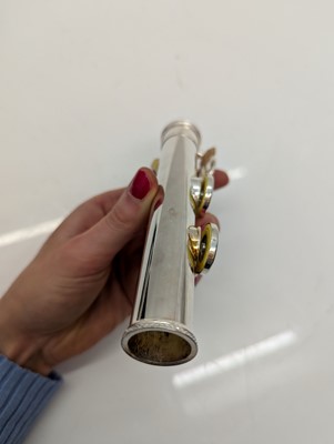 Lot 223 - Two Trevor J. James silver plated flutes