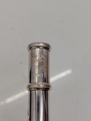Lot 223 - Two Trevor J. James silver plated flutes