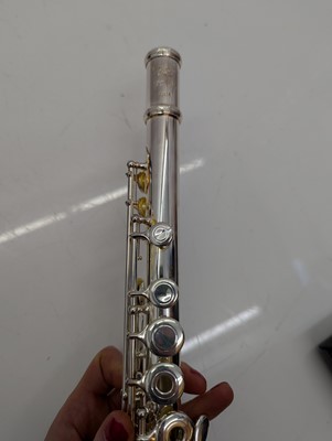Lot 223 - Two Trevor J. James silver plated flutes