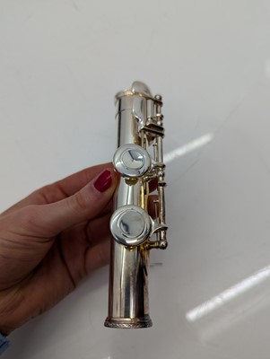 Lot 223 - Two Trevor J. James silver plated flutes