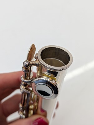 Lot 223 - Two Trevor J. James silver plated flutes